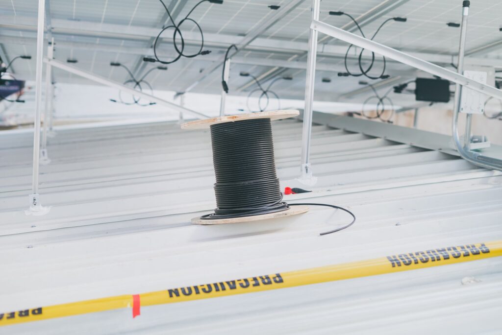 Electrical wire on a solar panel installation, provided by US cable suppliers.